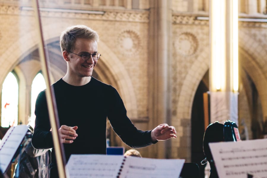 Joe conducting No Dice Collective in rehearsal